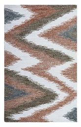 Hand-tufted chevron wool rug in brown and grey zigzag design.